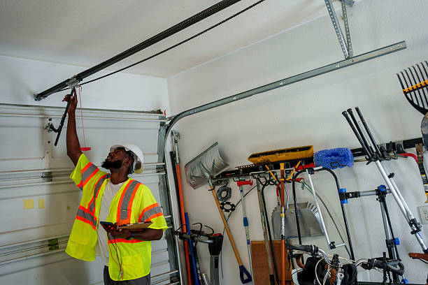 Professional Garage Door Panel Replacement technician working in Cliffside Park, NJ